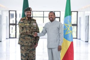 photo of Abiy and Buthan shaking hands